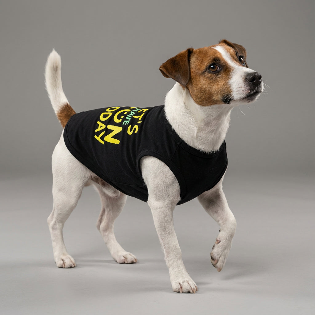 Playful dog modeling graphic dog tank top with "let’s have fun today" lettering