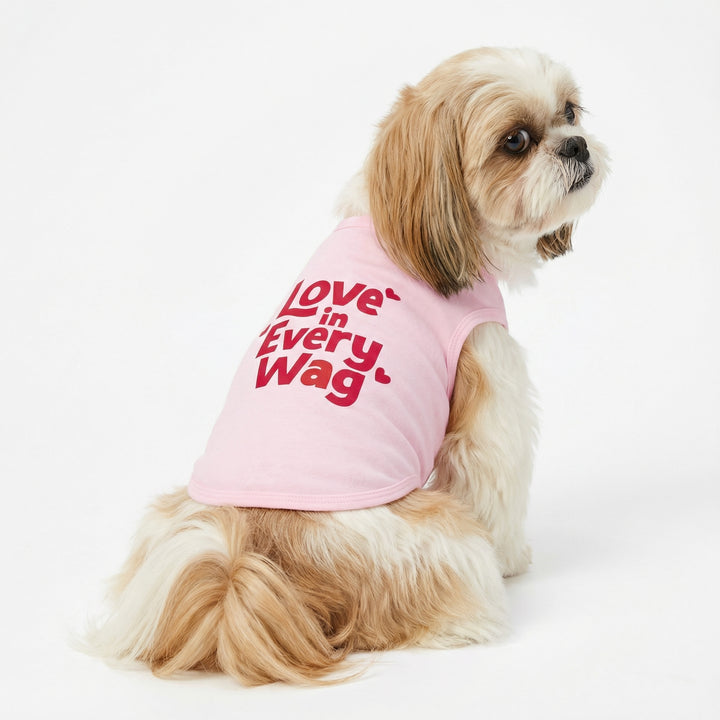 Pink dog shirt with red text 'Love in Every Wag' and heart accents