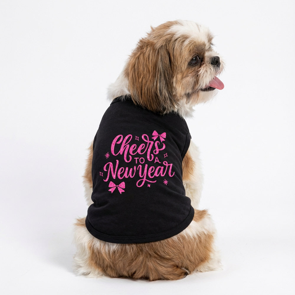 Cute dog wearing a dog tank top with 'cheers to a new year' lettering