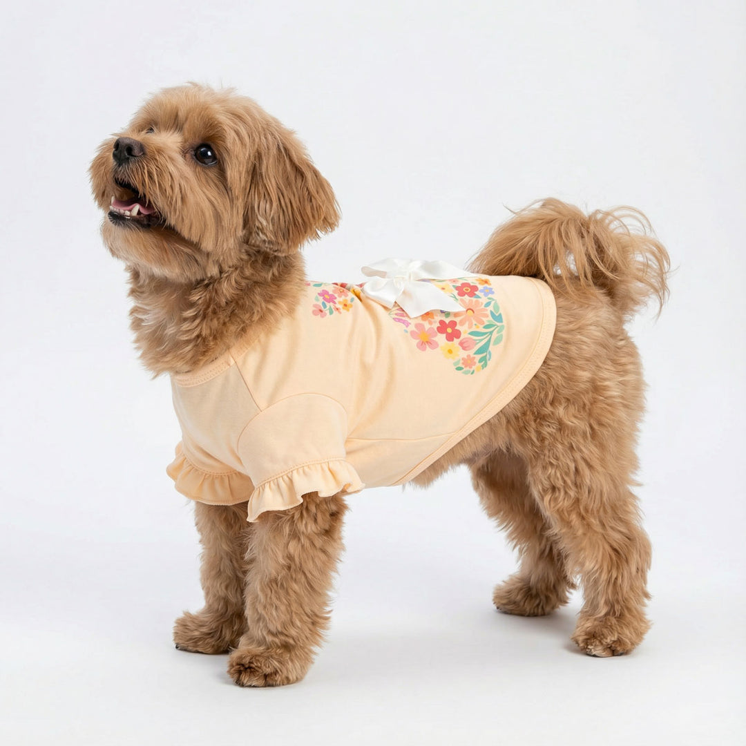 Cute dog in a floral dog Easter shirt with a white bowknot
