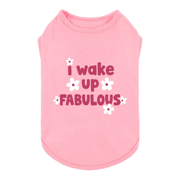 Pink sleeveless dog tshirt with the lettering 'I wake up FABULOUS' in dark pink and white flower graphics, shown on a plain white background