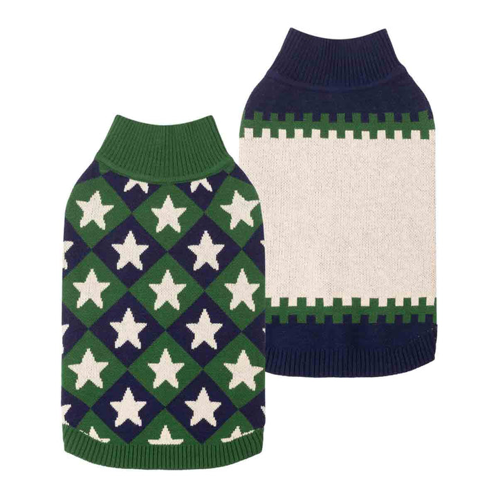 Two knitted sweaters for dogs shown on a plain white background. One sweater has a green and navy blue diamond pattern with white stars, and the other sweater shows the reverse side with a color block cream center panel, green border, and navy blue neck and hem