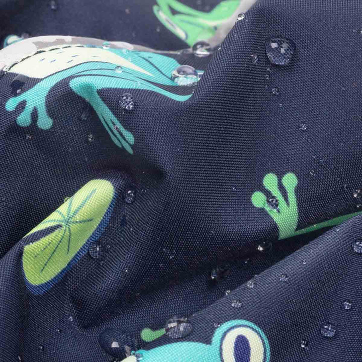 Close-p of waterproof fabric detail of frog dog raincoats