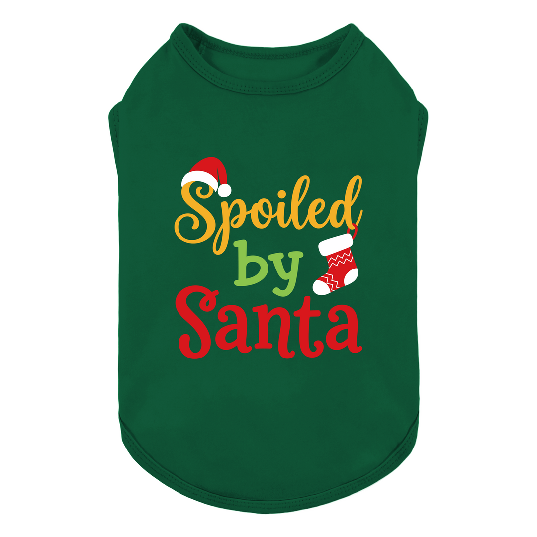 Green dog tank top featuring a festive graphic that reads 'Spoiled by Santa' in yellow, green, and red lettering, decorated with a Santa hat and a Christmas stocking
