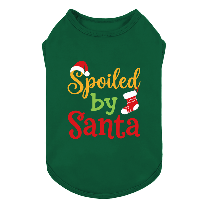 Green dog tank top featuring a festive graphic that reads 'Spoiled by Santa' in yellow, green, and red lettering, decorated with a Santa hat and a Christmas stocking