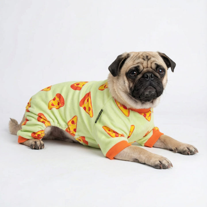 Pug lying on the floor with a funny pizza dog onesie