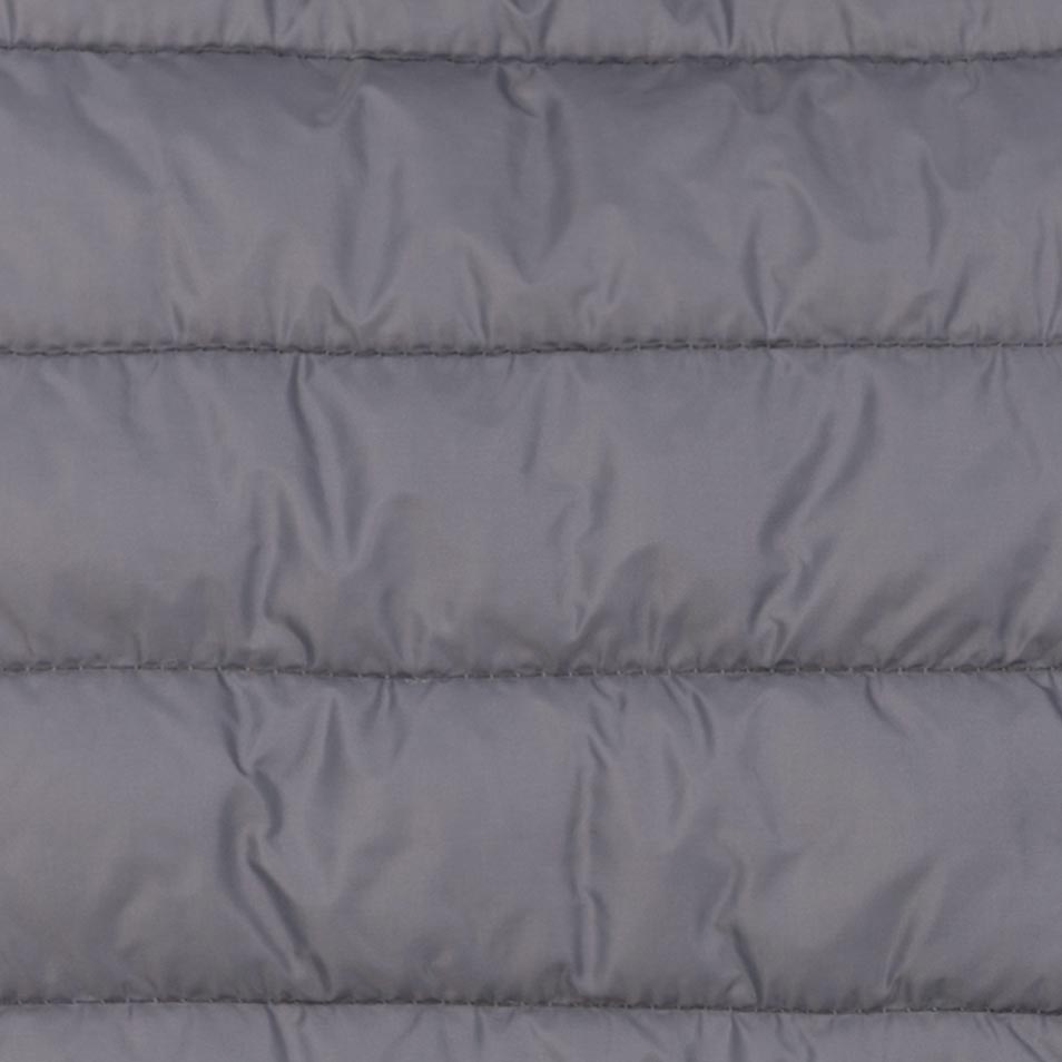 Close-up of quilted padding on a gray Dog hoodie, providing insulation and comfort.