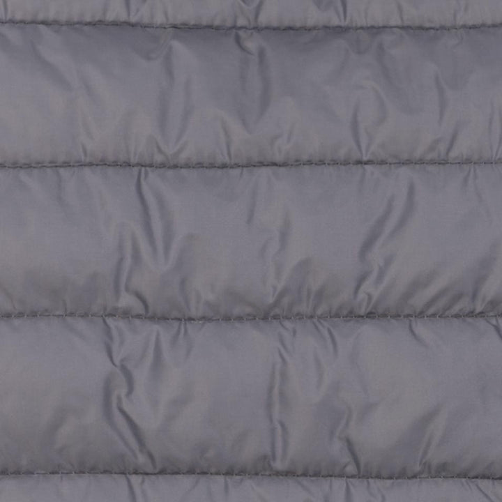 Close-up of quilted padding on a gray Dog hoodie, providing insulation and comfort.