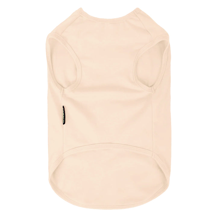 Back view of cream dog shirt with smooth fabric finish and wide arm openings for comfort.