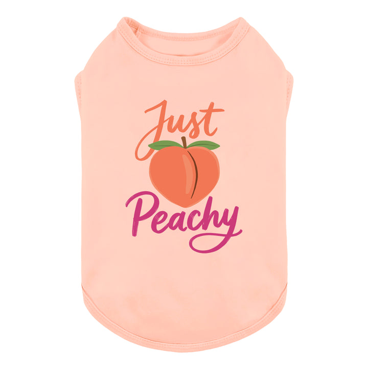 Peach-colored dog shirt with 'Just Peachy' lettering and peach graphic on a white background