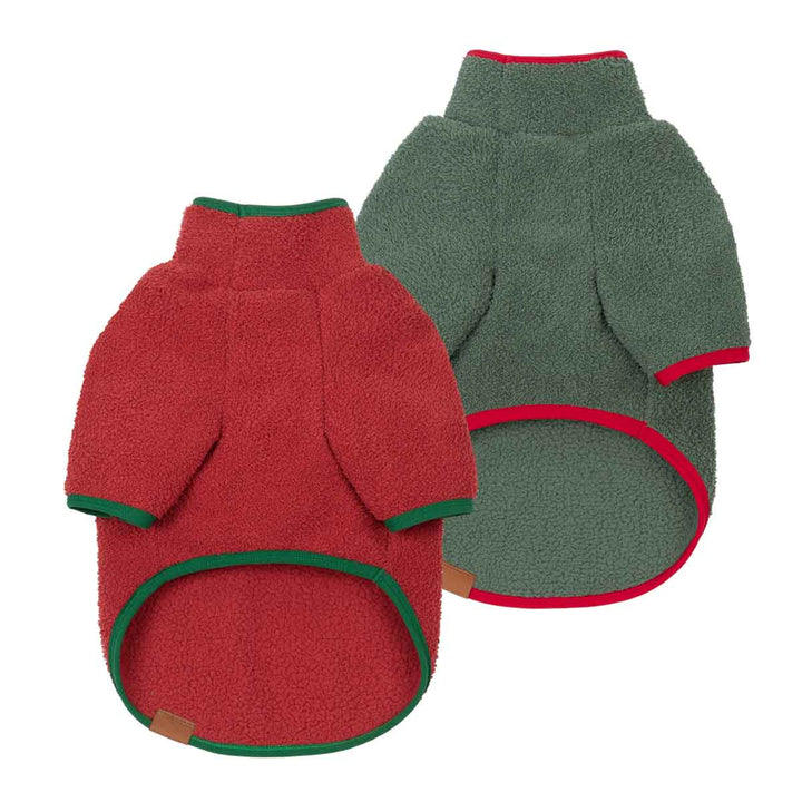 Two fuzzy dog sweatshirts shown on a white background, one in red with green trim and one in green with red trim