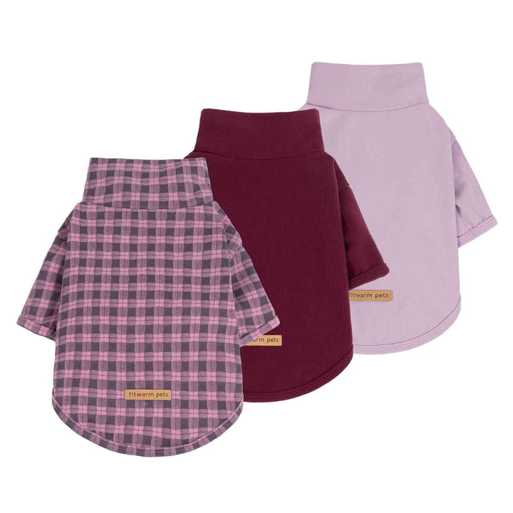 Three small dog sweaters shown from the back on a white background, overlapping in a fan arrangement