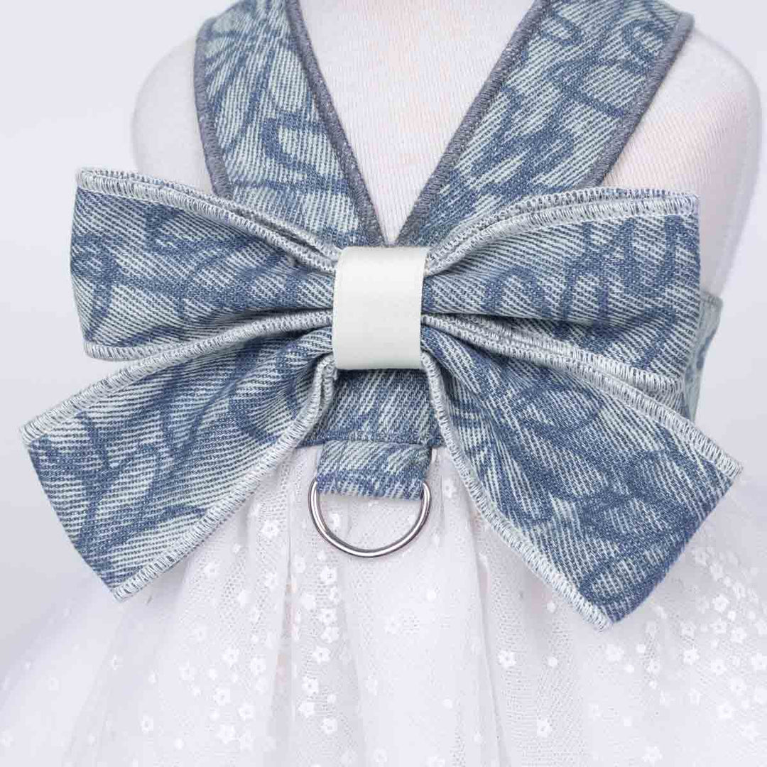 Denim bow tie on a white dog tutu dress with a white background