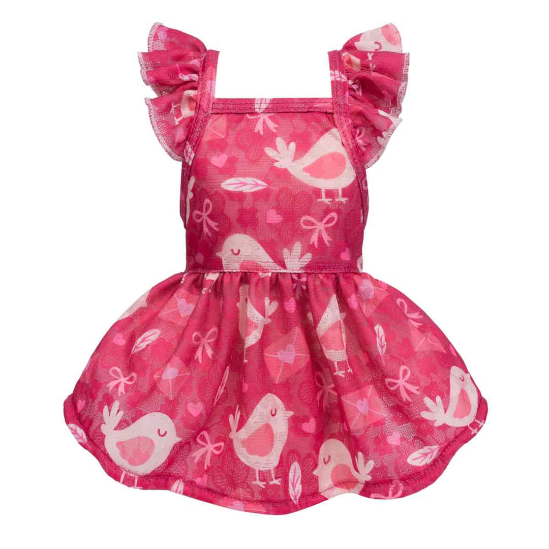 Pink ruffle dog dress with bird-print design displayed from the front.