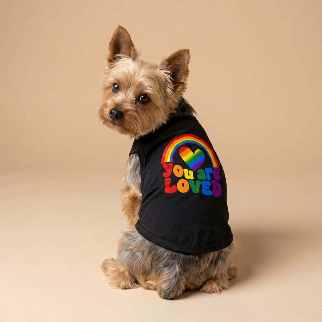 Yorkie looks back in a 'You are loved' dog t shirt