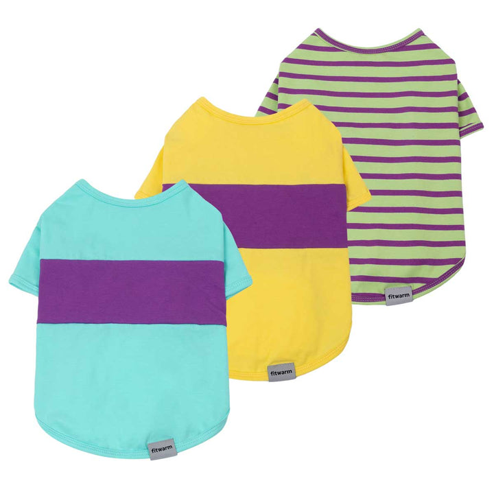 Three colorful pet shirts for dogs with different patterns on a white background