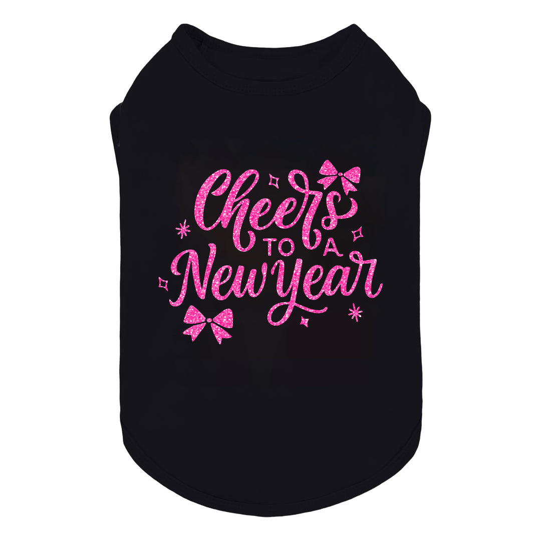 Black dog shirt with pink glitter 'Cheers to a New Year' text and bow accents displayed from the front.