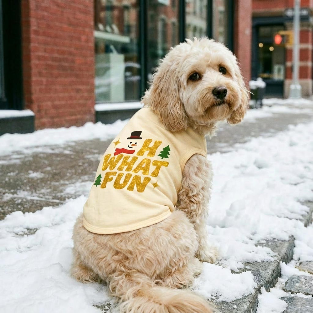Light yellow dog Christmas shirt with glitter "OH WHAT FUN" text, snowman, and trees.