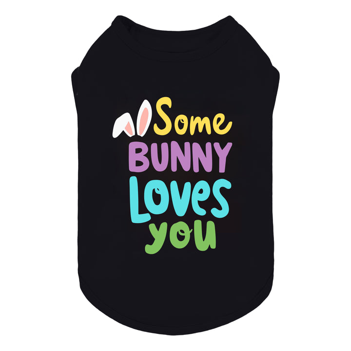 Front view dog shirt with colorful “Some Bunny Loves You” lettering on a black sleeveless dog top.