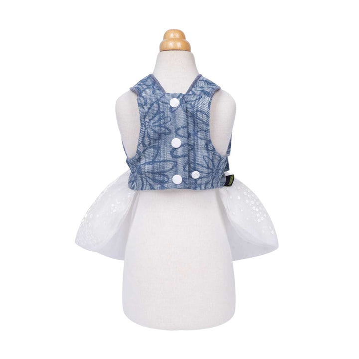 Mannequin wearing a denim harness dress for dog on a white background