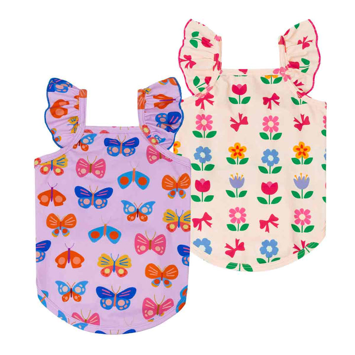 2 pack dog shirts with butterfly and floral patterns on a white background