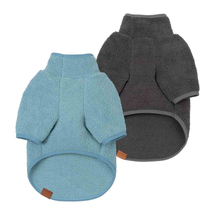 Two dog fleece sweaters shown on a white background, one in light blue and one in dark gray