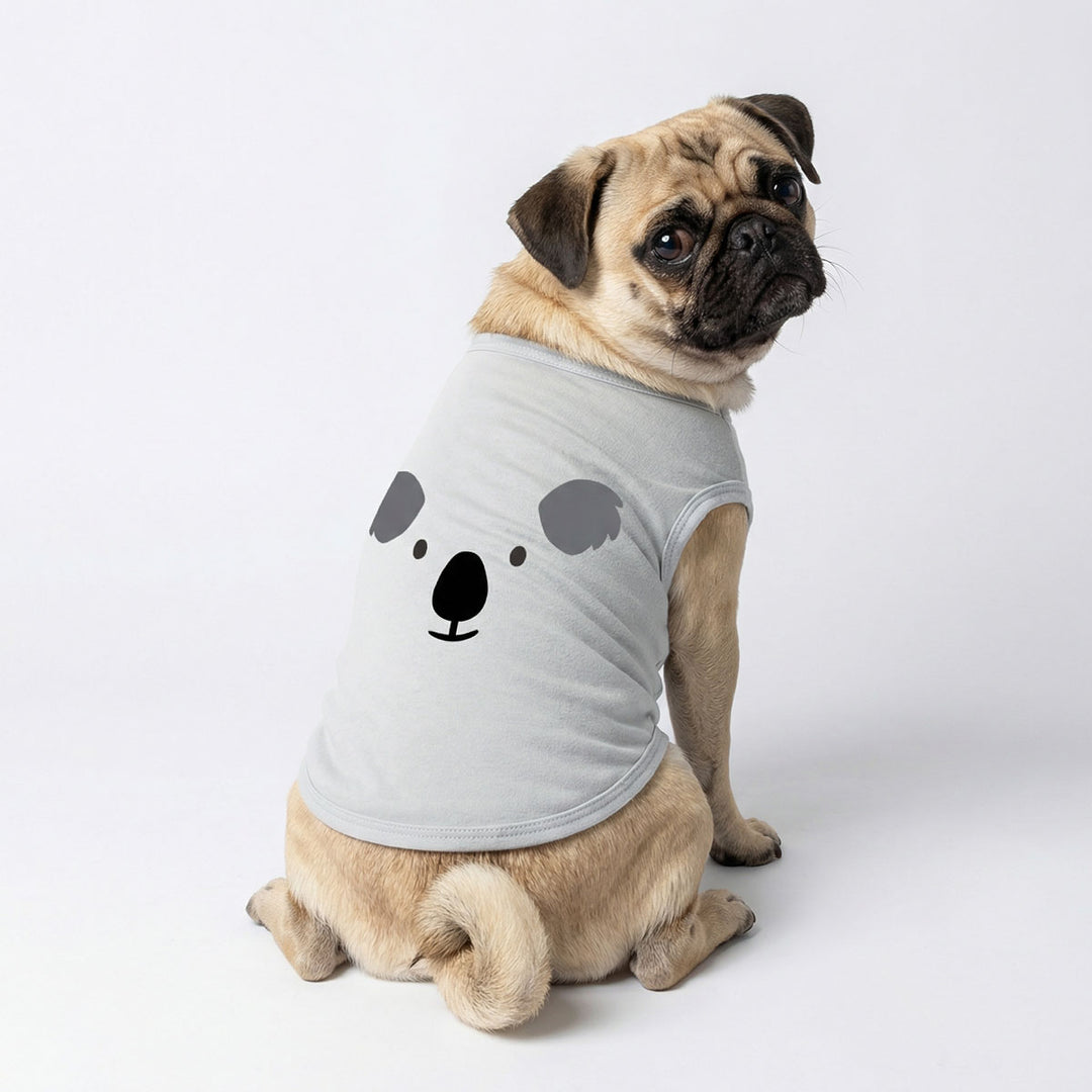 Pug wearing a sleeveless dog shirt designed with a koala print