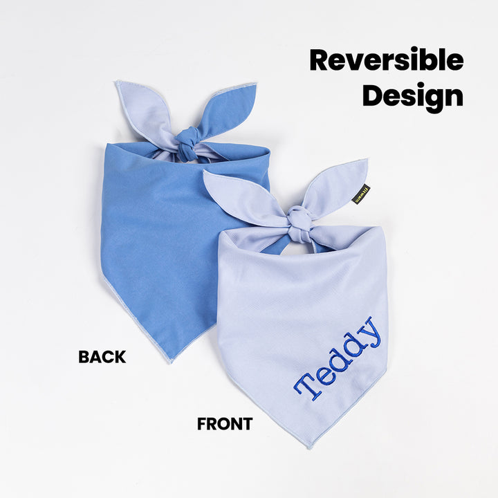 Reversible dog bandana with embroidered name on a white background