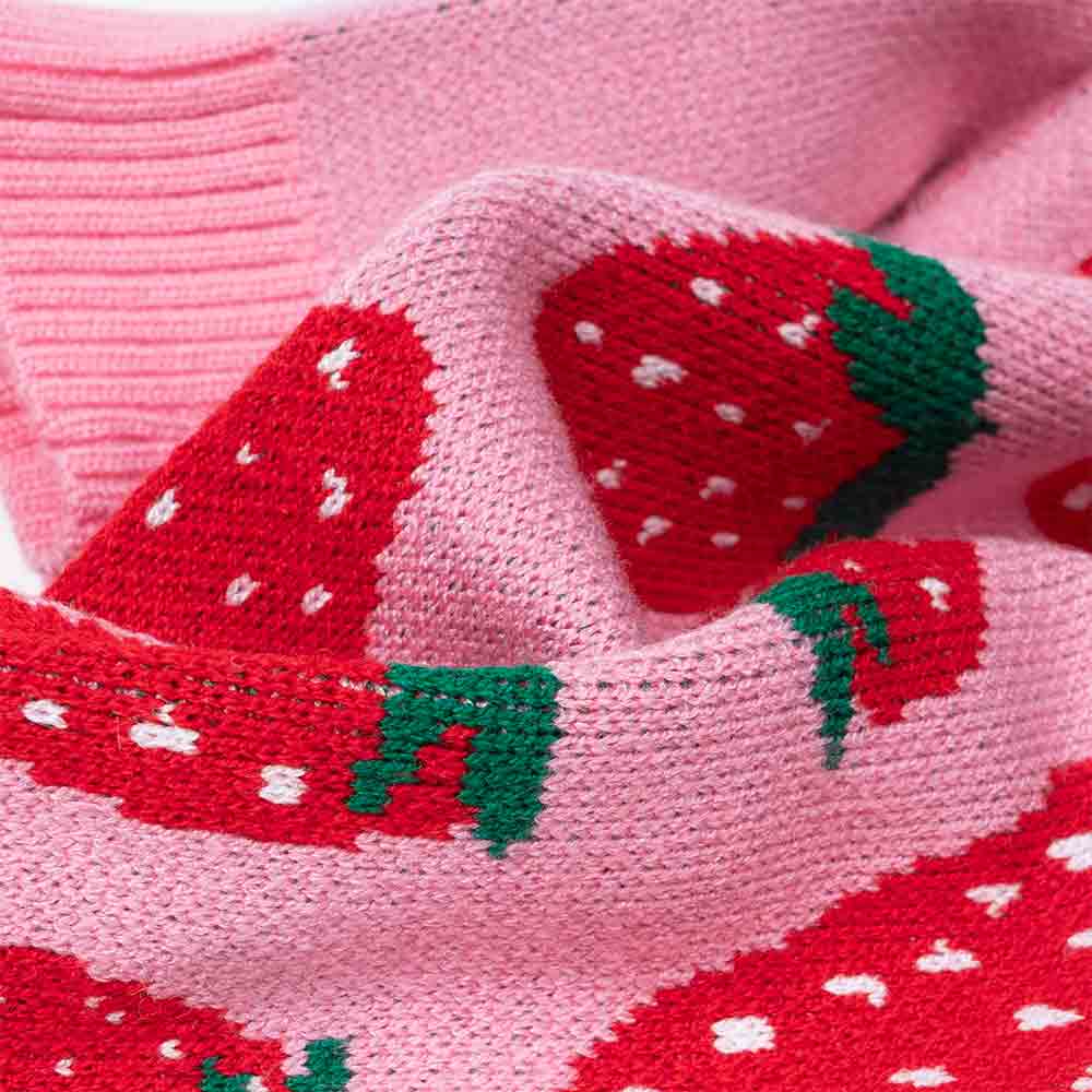 Knitted strawberry-print dog sweater in soft pink, ideal for small breeds.