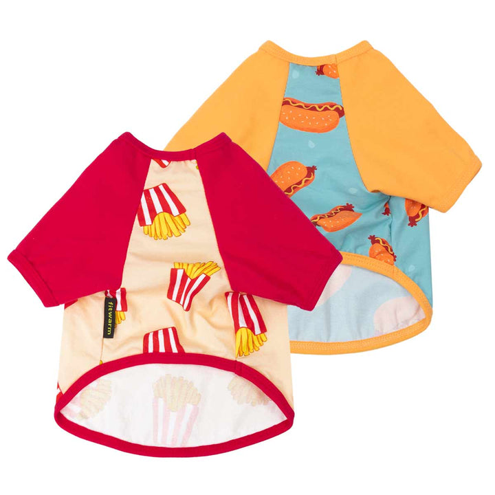 Two colorful dog t shirts with different prints on a white background