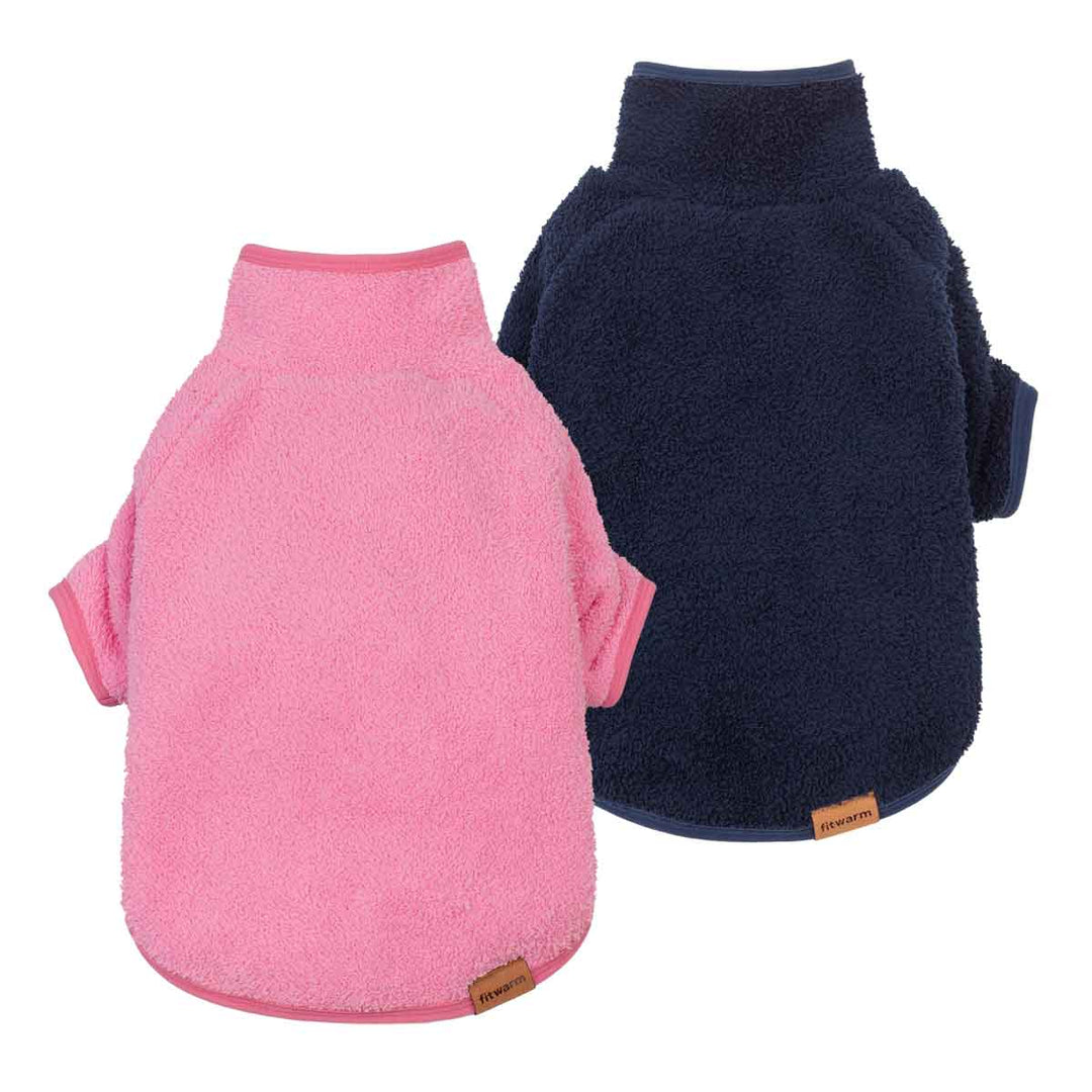 Two fleece dog sweaters shown on a white background, one in pink and one in navy blue