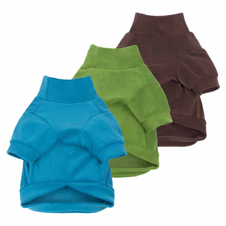 Three dog winter sweaters in blue, green, and brown on a white background