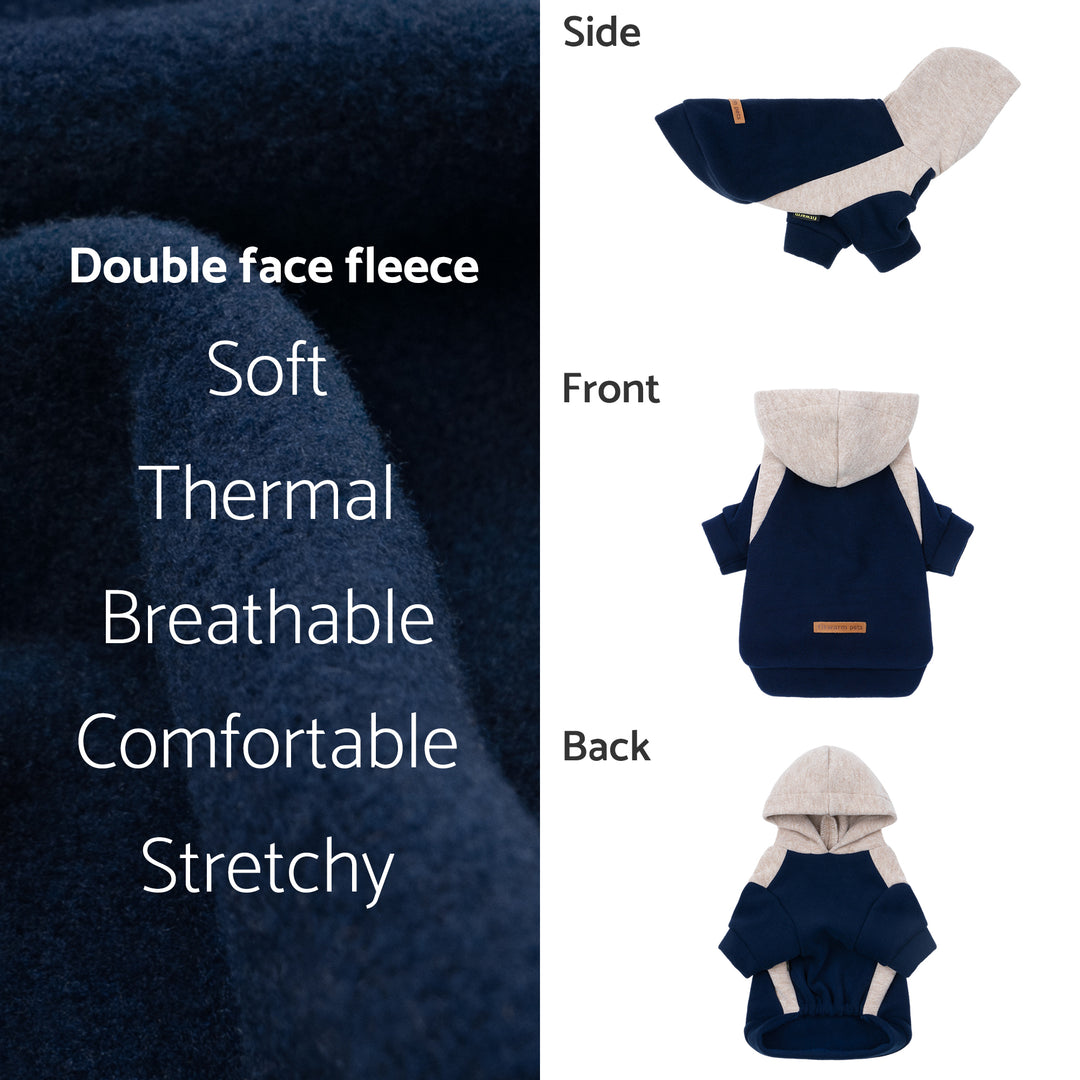 Dog hoodie in navy fleece presented with detail views and fabric close-up.