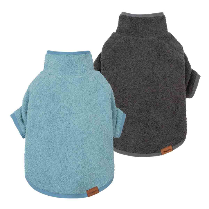 Two fleece dog sweaters shown on a white background, one in light blue and one in dark gray