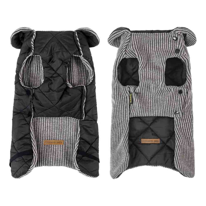 Reversible dog coat inside view with quilted black fabric and gray striped knit, showing leg openings and button closure.