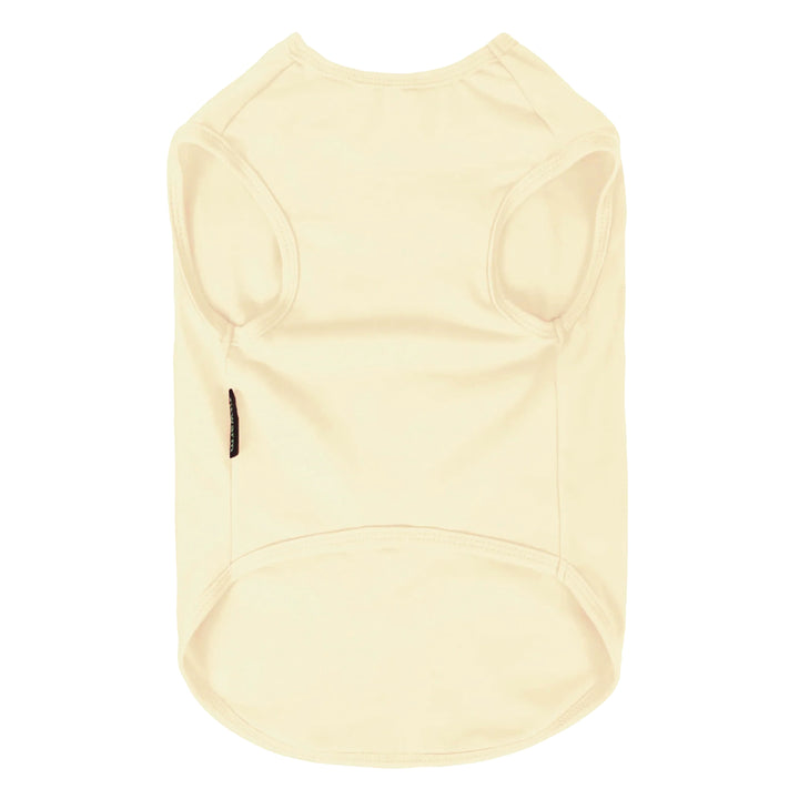 Back view of cream-colored dog shirt showing sleeveless design, smooth seams, and comfortable fit for dogs.