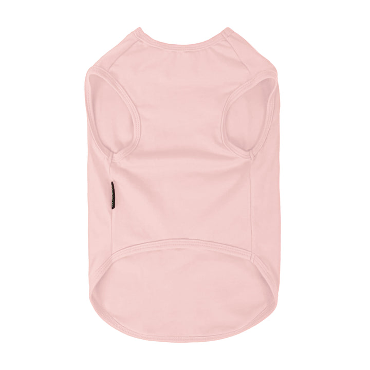 Plain light pink dog shirt showing sleeveless pullover design with Fitwarm label on the side.