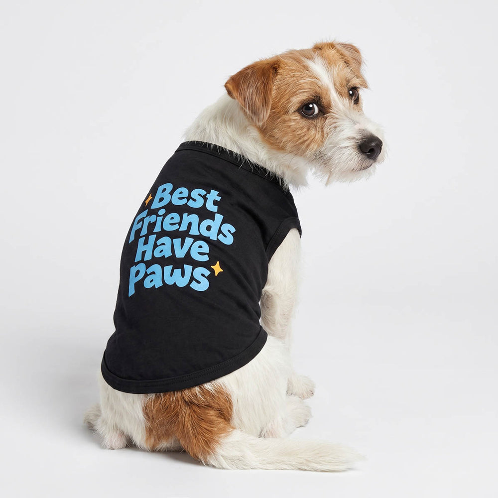 Back view of small dog in a black dog tank top in 'Best Friends Have Paws' lettering