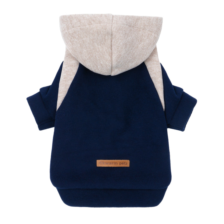 Blue dog hoodie with beige hood and sporty sleeves laid flat.