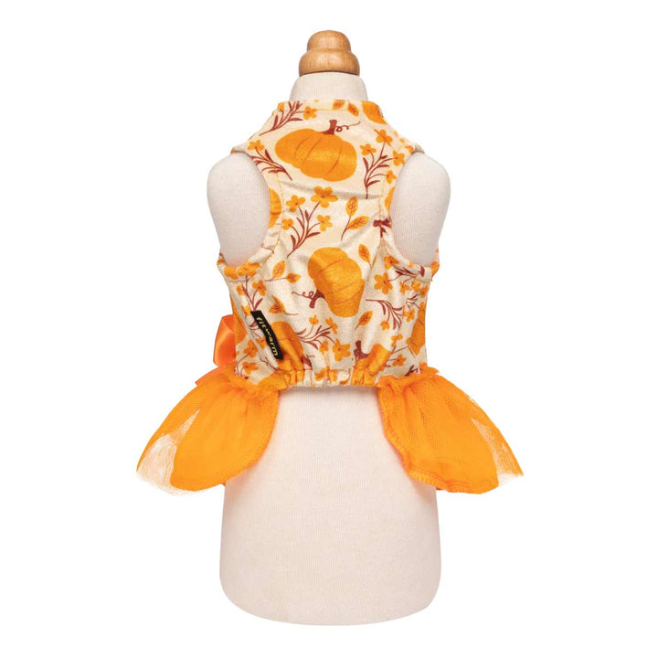 Festive dog dress featuring pumpkins, flowers, and a bright tulle skirt with a satin bow.