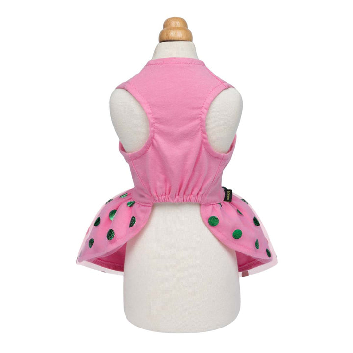 Back view of pink dog dress with green dotted skirt and sleeveless top.