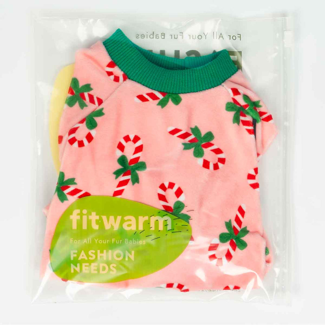 Packaged Christmas dog pajamas with pink fabric, candy cane prints, and green trim.