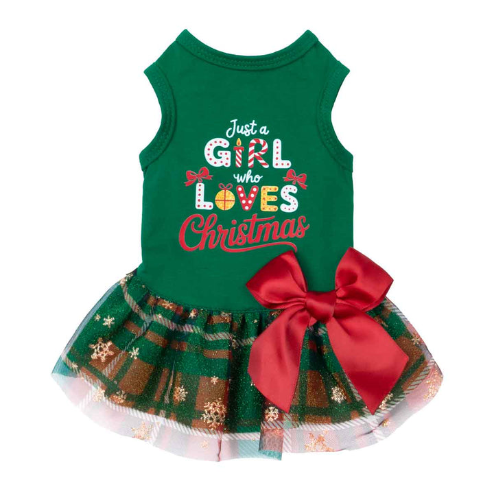 Christmas dog dress with green top, plaid tulle skirt, and red bow decoration.