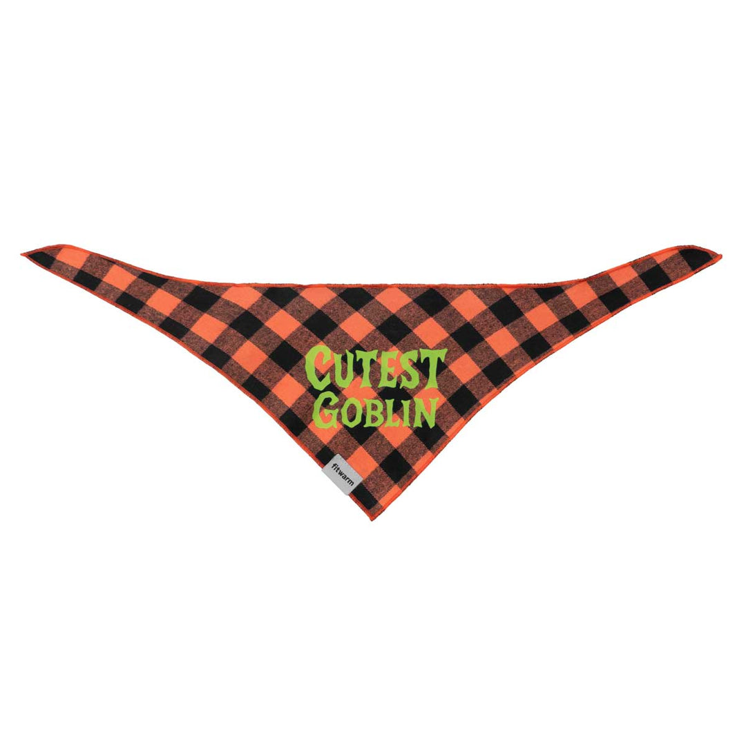 Orange and black plaid dog bandanas with “Cutest Goblin” lettering in green for Halloween.