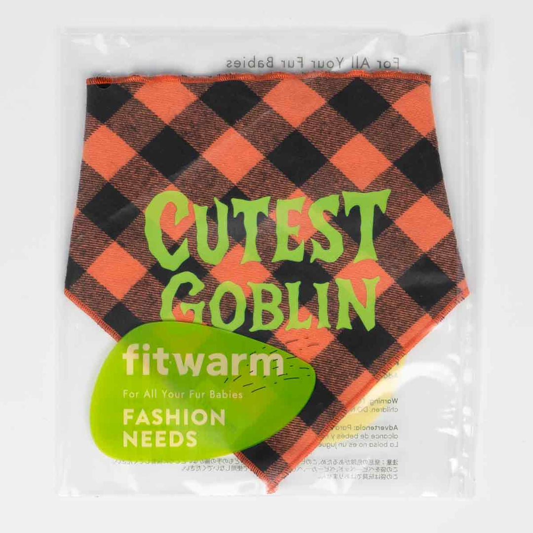 Fitwarm dog bandanas with orange and black plaid pattern and “Cutest Goblin” print in packaging.