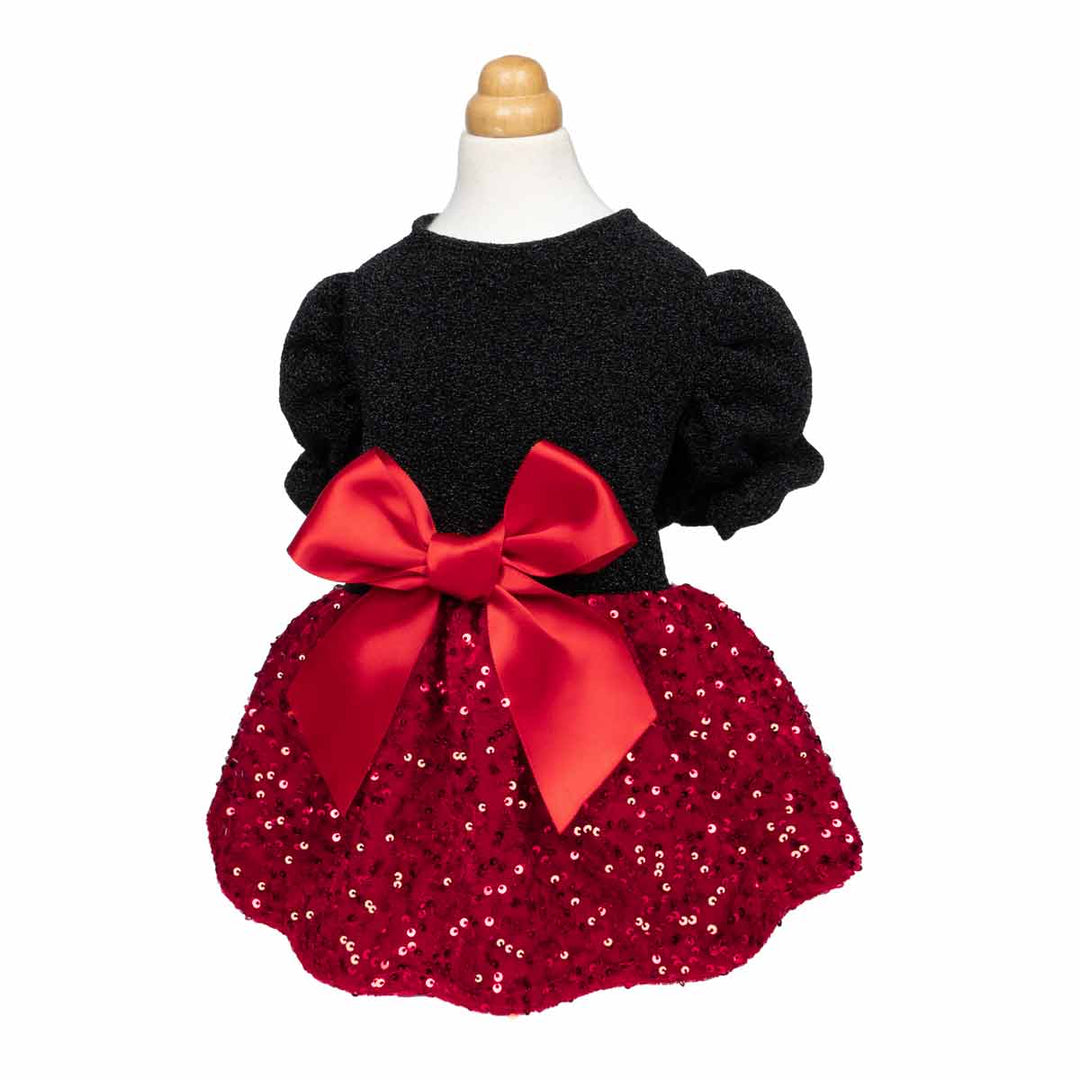 Elegant black and red dog dress featuring puff sleeves, sequin skirt, and large satin bow.