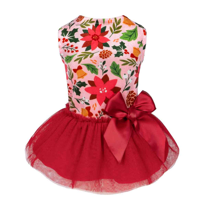 Festive dog dress featuring red poinsettia and holly prints with a red tulle skirt.