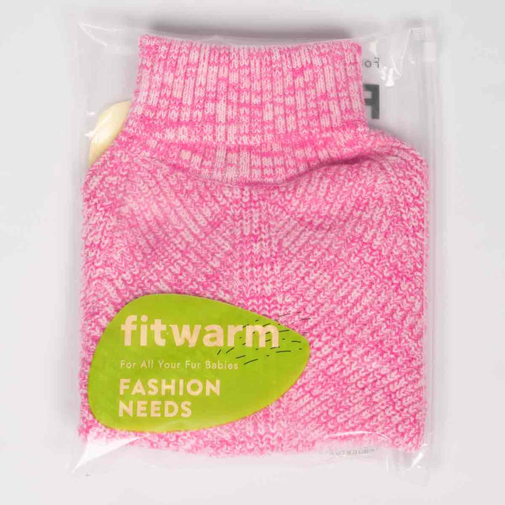 Pink knitted dog sweater in Fitwarm packaging, neatly folded with visible turtleneck detail.