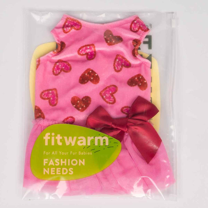 Pink pet dress with red hearts and a bow, labeled 'fitwarm'.