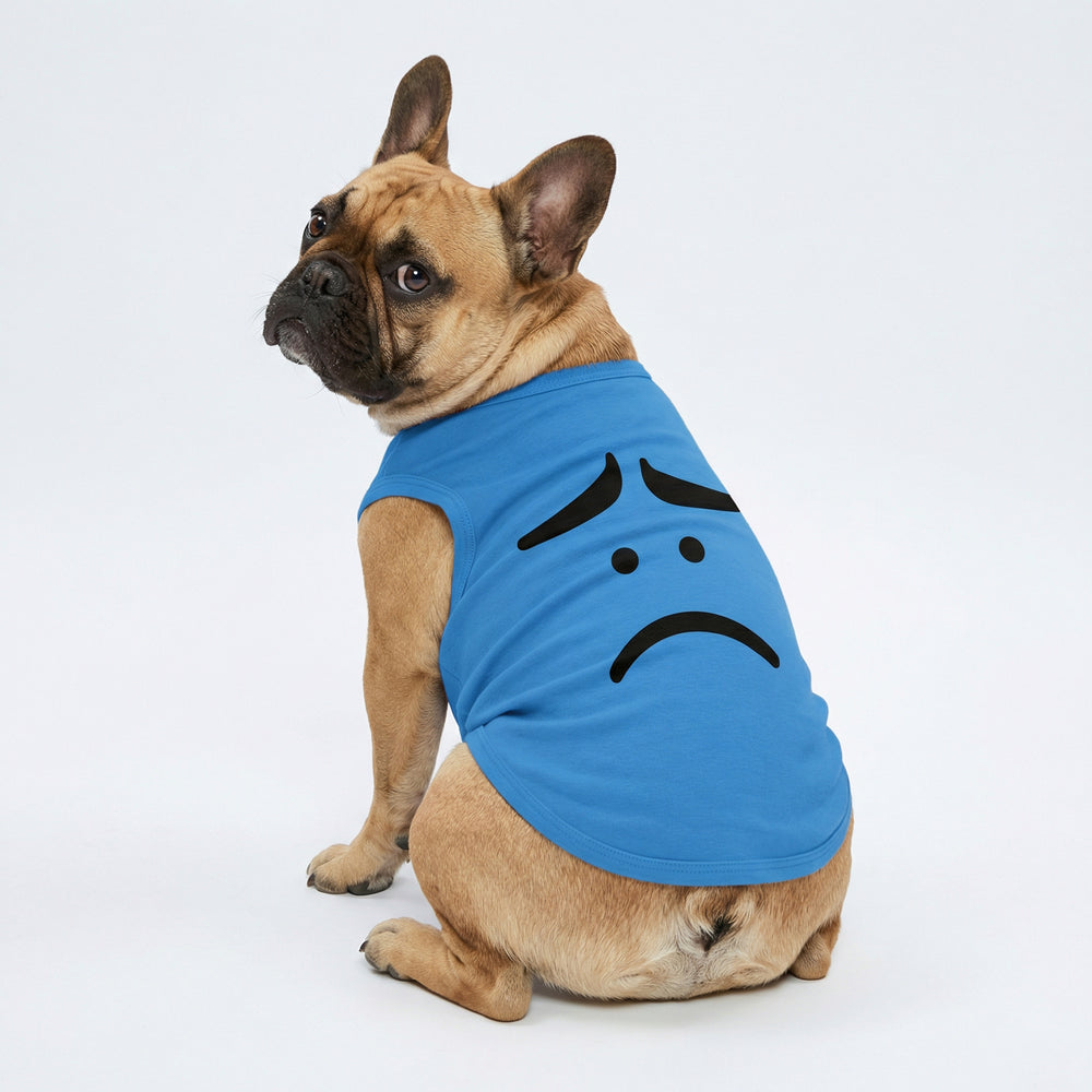 French bulldog modeled in blue dog tee featuring a sad expression graphic design